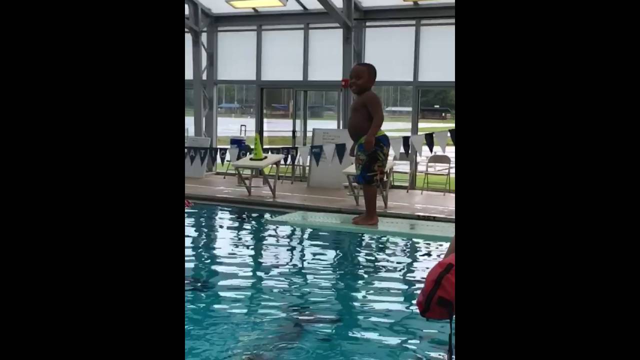 4 year old  diving in 12ft pool
