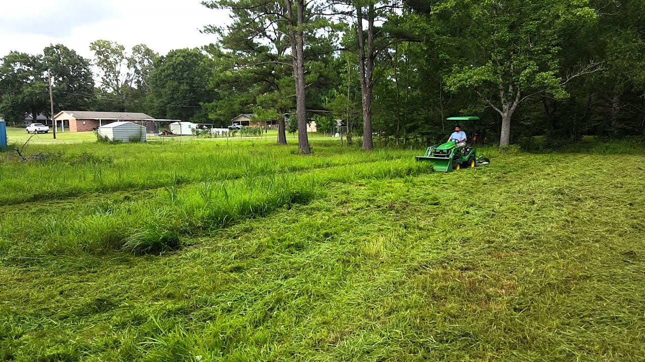 John deere 1025r rotary cutter action pt1 YouTube
