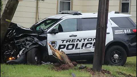 Woman steals Trenton Police car, Crashes into pole...