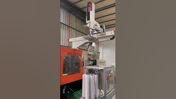 Runma robot matched with injection molding machines to pick up and sort out plastic hangers.