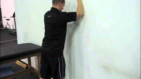 EricCressey.com: Wall Slides with Overhead Shrug