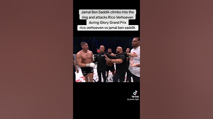 Jamal Ben Saddik climbs into the ring and attacks Rico Verhoeven during Glory Grand Prix