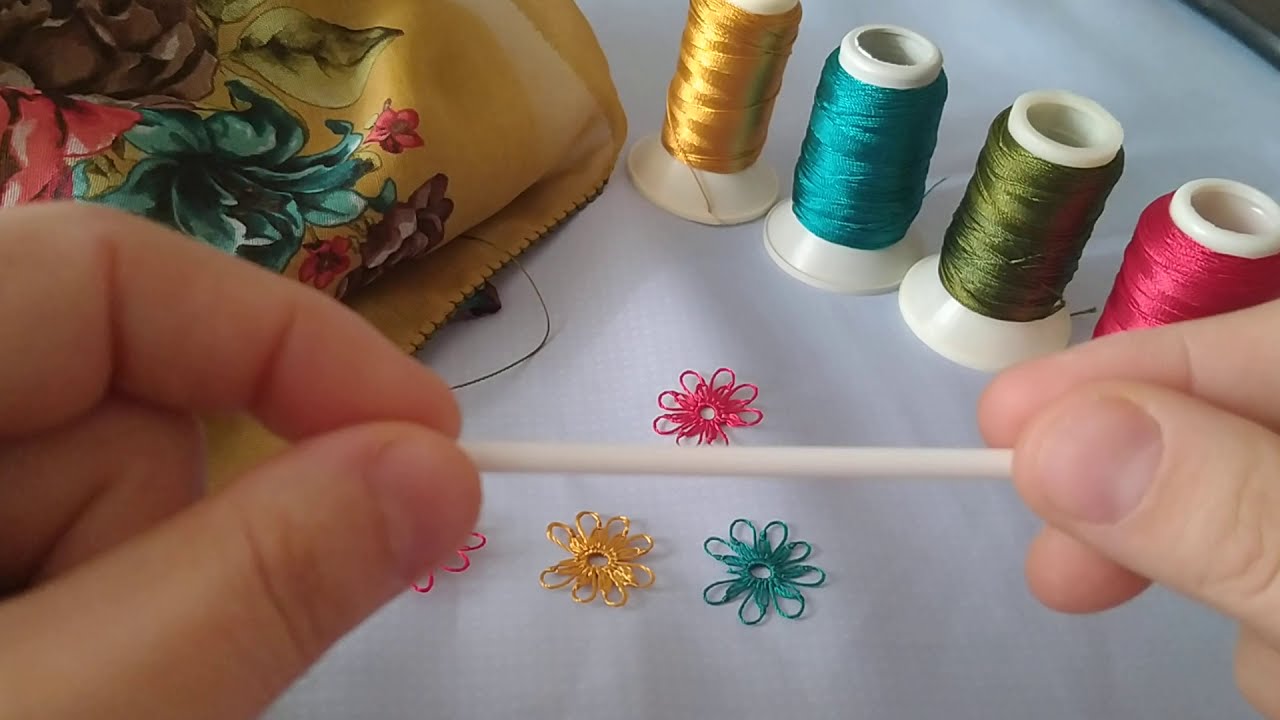 Gösterişli şık fakat kolay yapılabilen igne oyası /çiçek  iğne oyası örnegi.