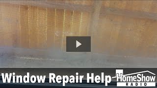 How do I get what looks like dirt cleaned out from inside double pane windows?