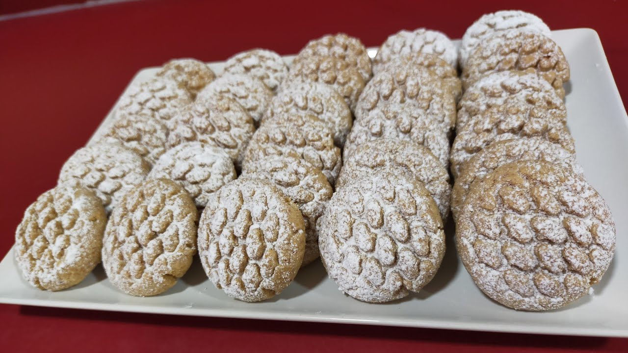 غريبة جنحلان( السمسم) وكاوكاو بدون بيض كتجي هشيشة ومرملة من أروع ما يكون