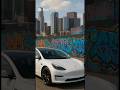 Sora 2 video featuring the Tesla in a graffiti-covered urban street scene: #sora2
