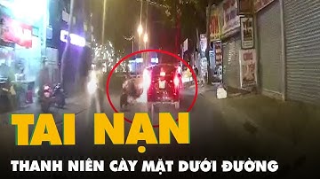 Nam thanh niên cày mặt dưới đường sau pha đối đầu với ôtô