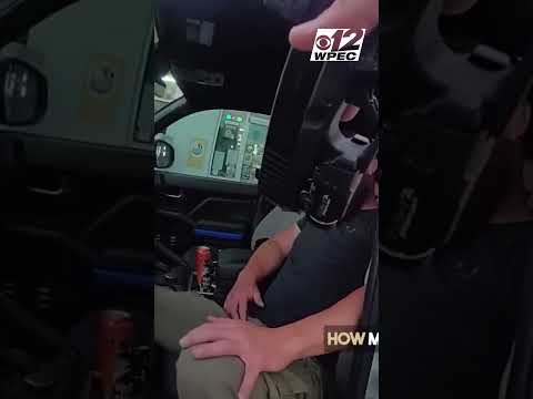 Florida man arrested after deputies find him passed out at pump with child, guns in car