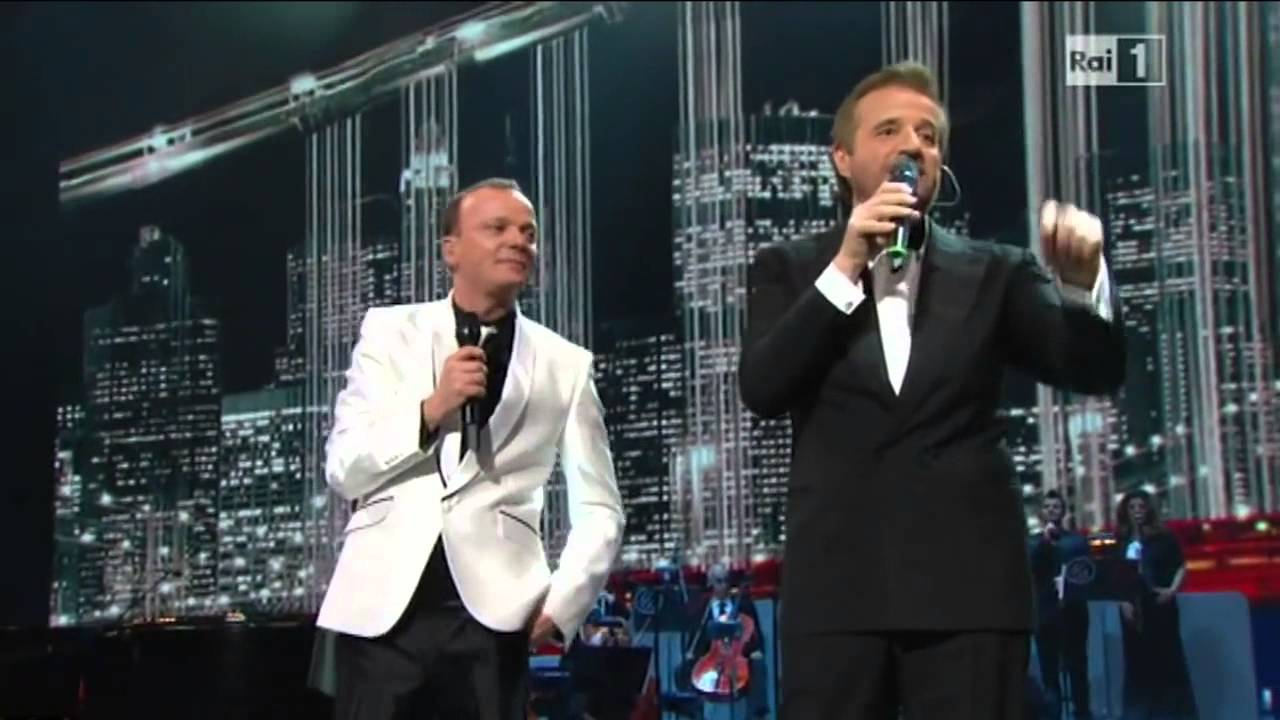 UNIDEA per Tu vuò fa l'Americano - Gigi d'Alessio & Cristian de Sica