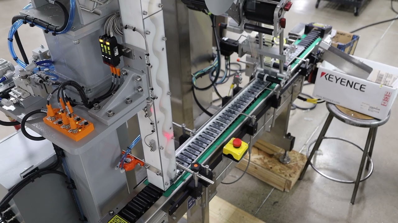 Syringe Cartridge Labeling Orienting Horizontal Roller System w/ Hopper