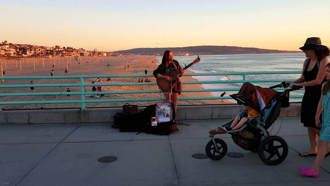 Katherine Terrien sings by the beach