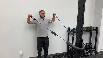 Standin Standing Cuban rotation with band g Cuban rotation with band