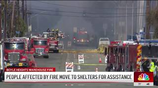 People affected by Boyle Heights warehouse fire move to shelters for assistance