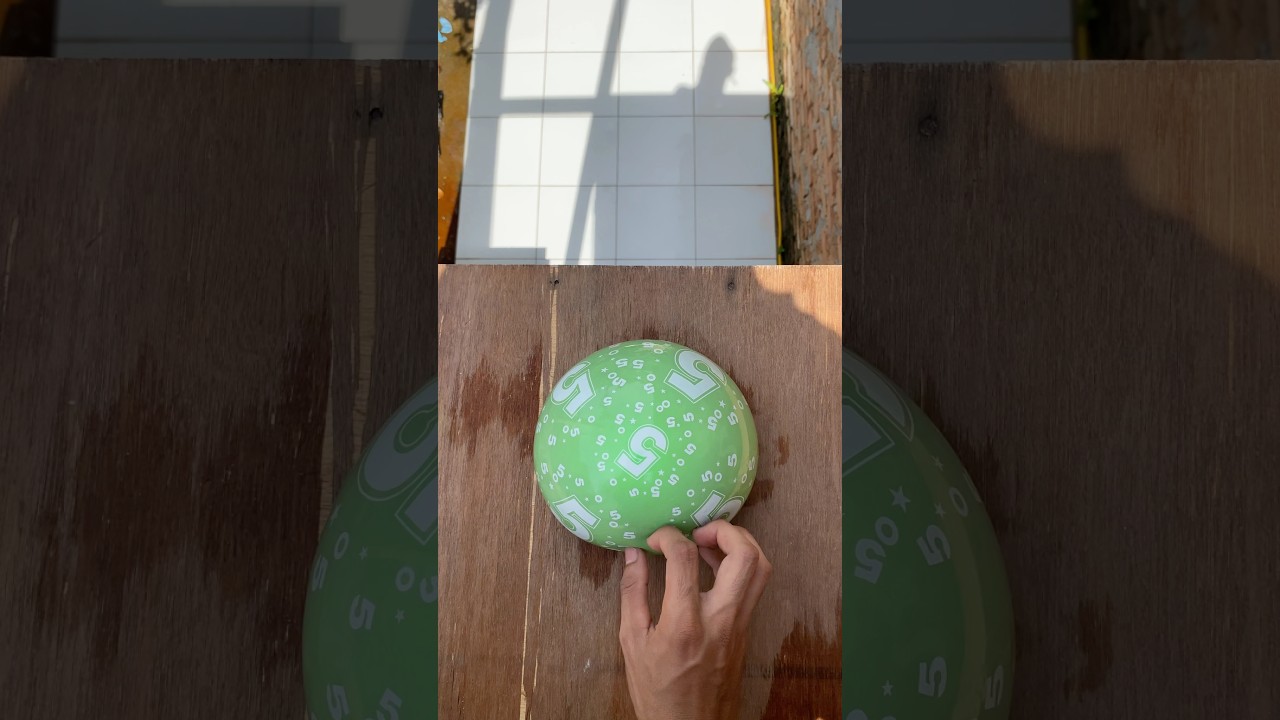 Experiment: Dropping green, yellow and purple water balloons from a height