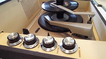 Motorola STEREOPHONIC automatic record player playing a stack of 45