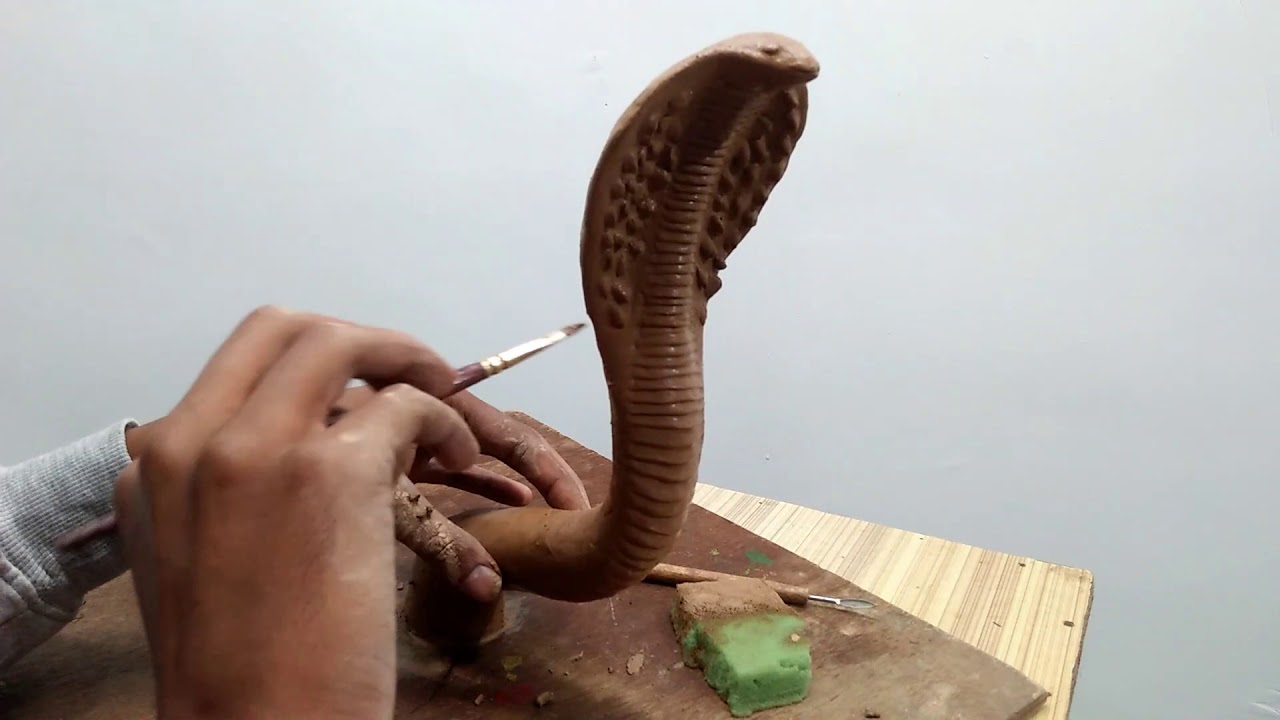 clay snake sculpture