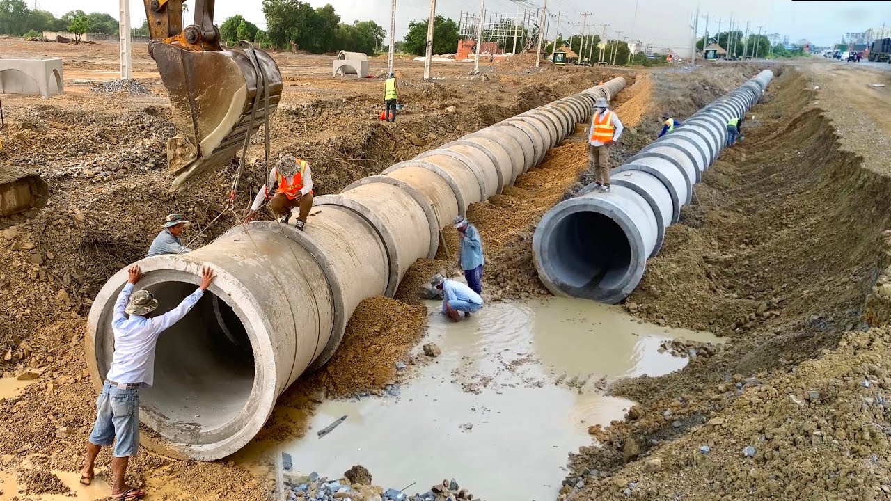 New Side Drainage Construction Technical Installing Concrete Pipes - CAT Excavator