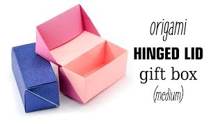 Learn how to make a hinged origami box! it's made from 2 sheets of
paper and no glue. this gift box is perfect for many different kinds
presents, ...