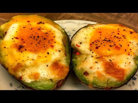 Avocado with egg and cheese . Surprisingly tasty ! Know what to cook !