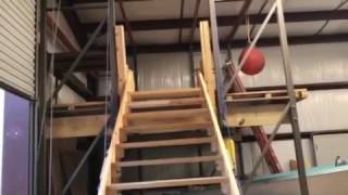 Garage loft staircase that uses minimum space.