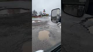 Truck Stop 🕳️🕳️Potholes Are Huge #Potholes #Truckstops #18Wheeler