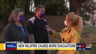 Firefighters battle to maintain the upper hand on a huge fire north of Los Angeles
