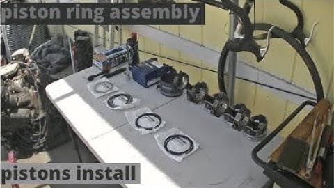 Chevy 350 budget rebuild pt 5, installing piston rings, and pistons into block