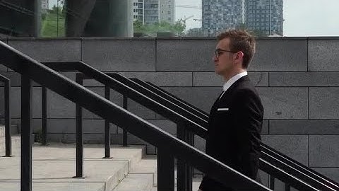 Businessman Walking Up Stairs Stock Video