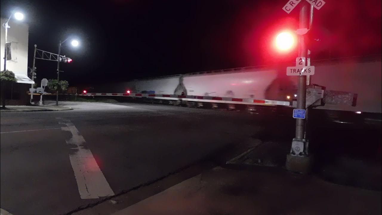 P098 departs Kingstree with a southbound manifest passing on track two