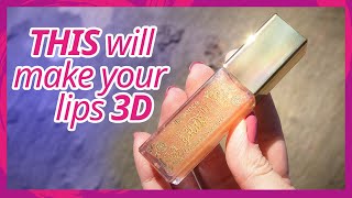 essence the glowin golds lip oil