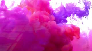 Colored paints mix under water  Colorful smoke explosion