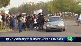 Protesters hit by cars outside McClellan Park during Trump visit