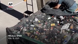 Spain police rescue migrants hidden in containers