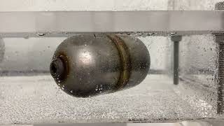 Vacuum Bubble Leak Testing of Steel Floaters