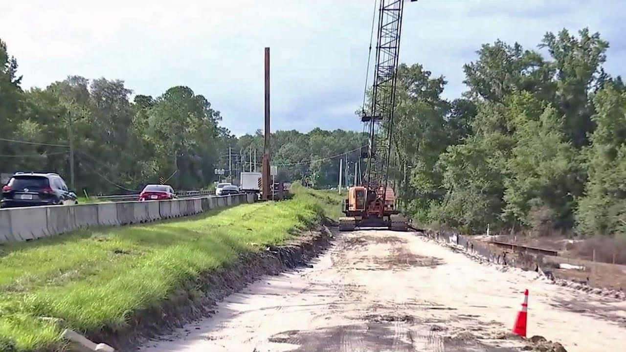 Man freed after crane working on Clay County bridge project falls - YouTube