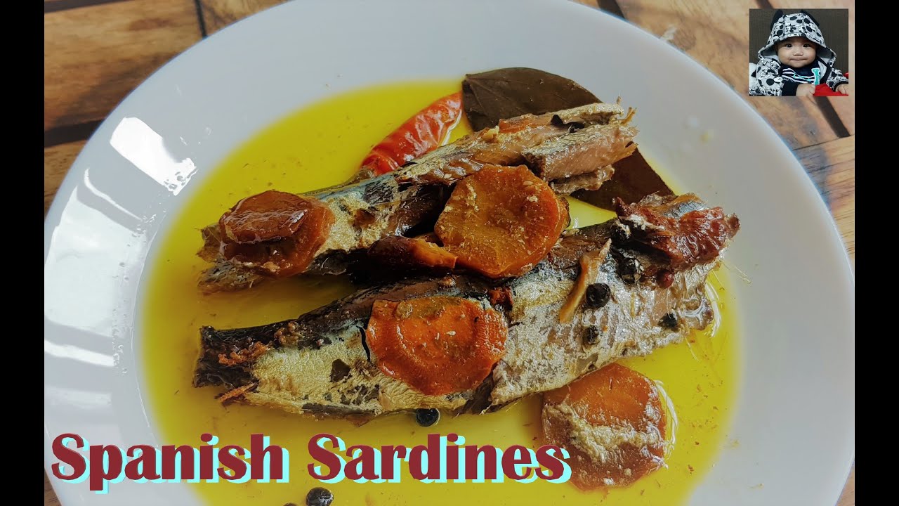 Spanish Sardines in a pot slow cooked spanish sardines spanishsardinesrecipe pinoyfoodSG