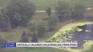 Child in critical condition after being pulled from pond in suburbs