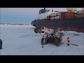 Antarctica.  Unloading crane on fast ice. Антарктида. Выгрузка крана на ледовый припай