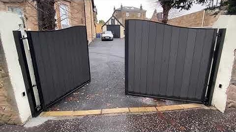 Composite Swinging Gate on a Steep Incline