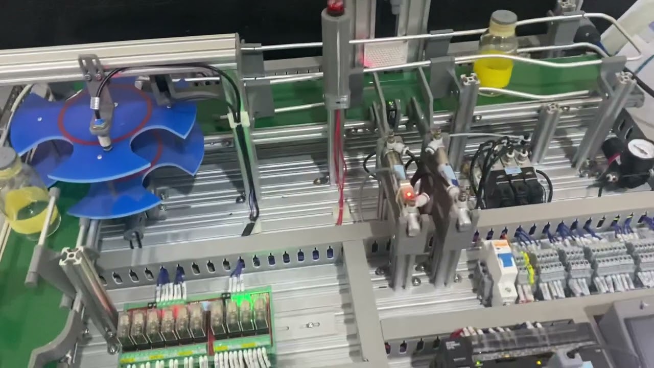 Filling Machine Station Trainer - PLC Omron with HMI NB Series - YouTube