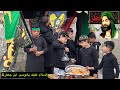  اطفال ينصبون موكب من مصرفهم الخاص ويخدمون زوار الامام موسى ابن جعفر  