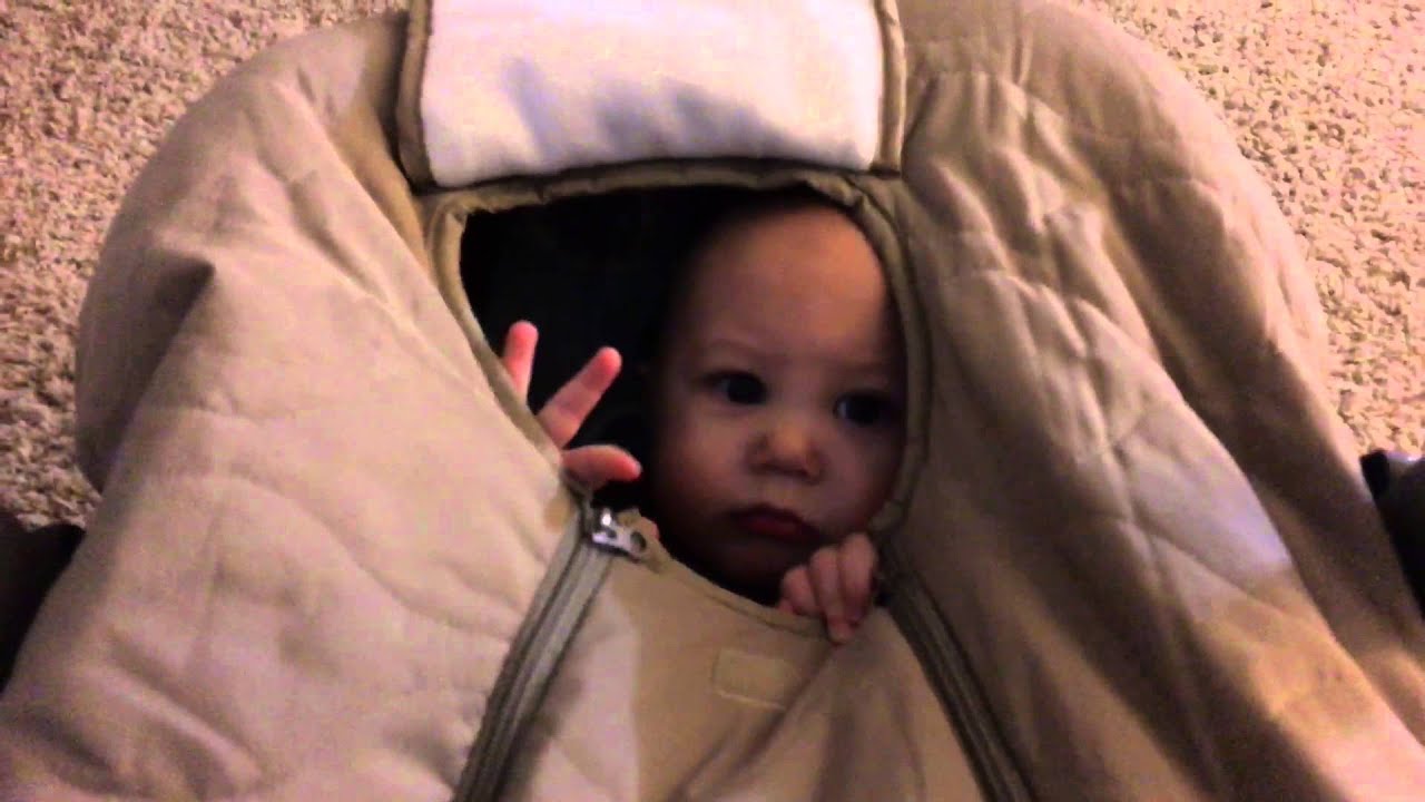 Peirce wistfully requests being let out of his Cozy Cover car seat ... Peirce wistfully requests being let out of his Cozy Cover car seat ...