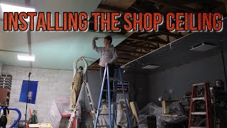 Installing the new shop ceiling! One step closer to finished!