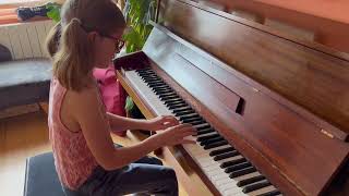 Eliza plays the piano