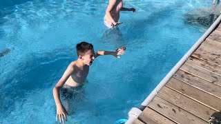 Bully pushed in pool