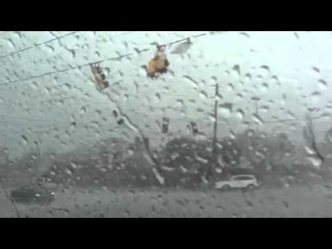 Traffic light blows off in a storm - YouTube