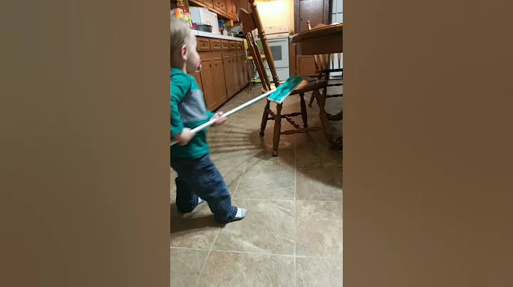 Boys sweeping Grandma's