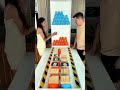 Couples challenge each other to a cup-stacking game! Who will win? Come witness this hilarious