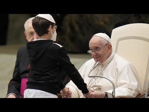 Little boy steals the scene at Pope