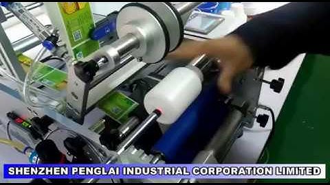 semi Auto wrap labeling machine for round bottles jars pails vials with auto activation
